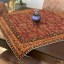 رومیزی مربع ترمه طرح پاسارگاد رنگ قرمز نارنجی